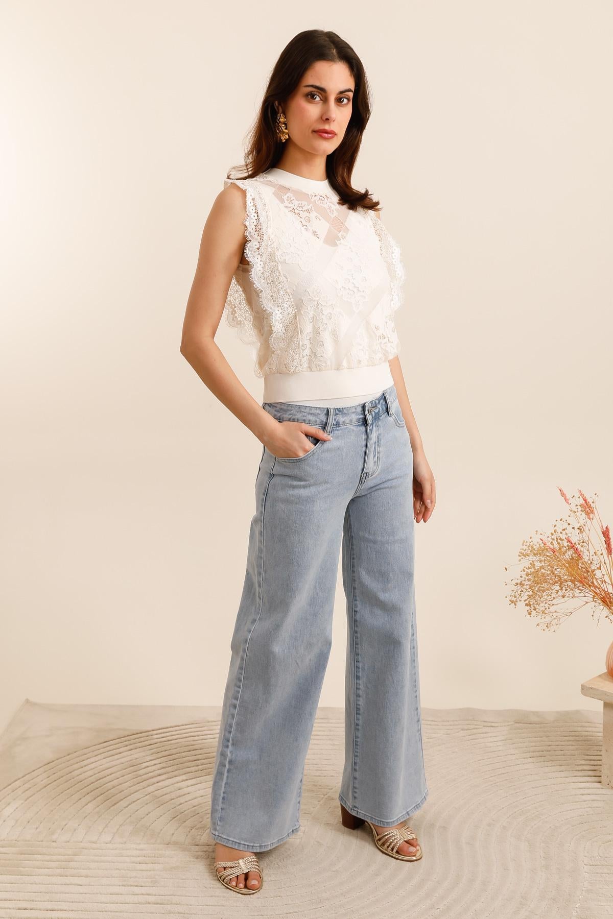 Top Clara en dentelle semi-transparente